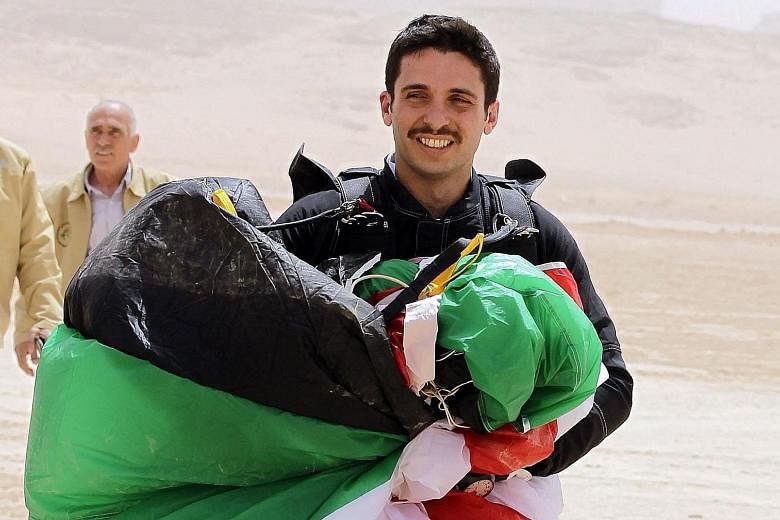 Jordan's Prince Hamza bin Hussein (left) is the younger half-brother of King Abdullah II (right). Prince Hamza was the crown prince for four years before the title was transferred in 2004 to the king's eldest son, Prince Hussein.