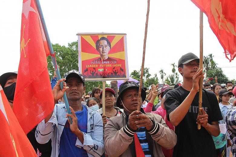 Protesters calling for the release of detained Myanmar civilian leader Aung San Suu Kyi during a demonstration against the military coup in Launglone township in Myanmar's Dawei district yesterday. Six people were killed at the weekend, according to 