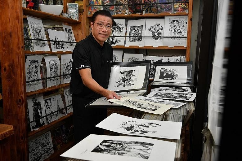 Mr Benjamin Foo with some of his sketches of his favourite Marvel and DC artwork. The 57-year-old's interest in art was reignited during the circuit breaker period and he went on to sketch 57 pieces to coincide with his age. The original artworks by 