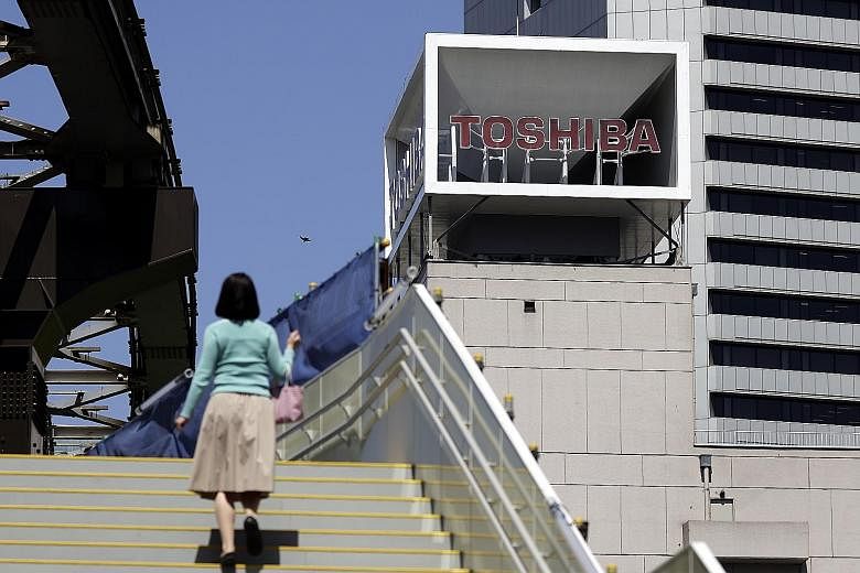 Shares in Toshiba soared 18 per cent to their daily limit yesterday, after news that the Japanese industrial group had received a proposal from private equity firm CVC Capital Partners to take it private.