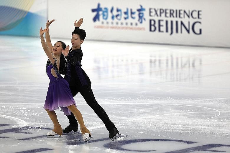 Athletes taking part in a figure skating competition held as a test event for the 2022 Beijing Olympics at the Capital Indoor Stadium in Beijing last Saturday. Chinese President Xi Jinping and Foreign Minister Wang Yi raised support for the Olympics 
