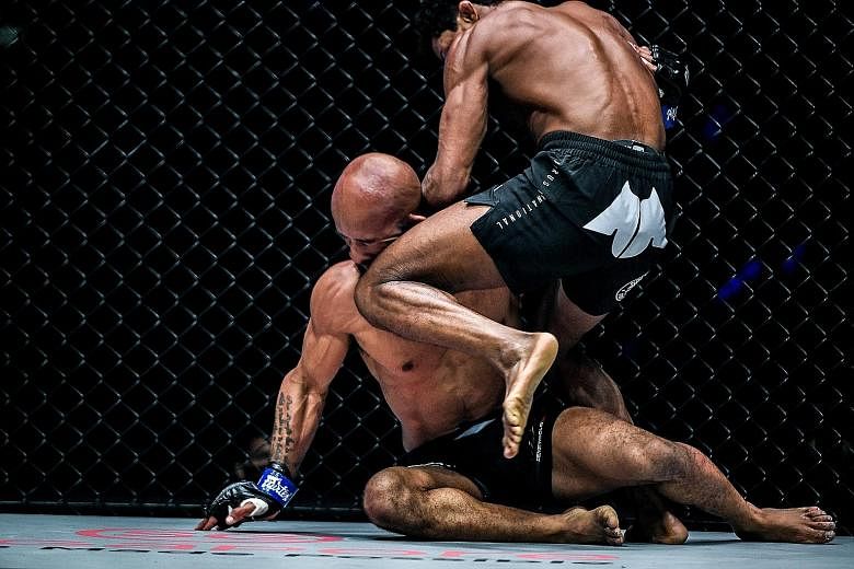 One Championship's flyweight world champion Adriano Moraes retained his title after knocking out Demetrious Johnson with a brutal grounded knee at the One on TNT 1 event at the Singapore Indoor Stadium yesterday. It was the American's first knockout 