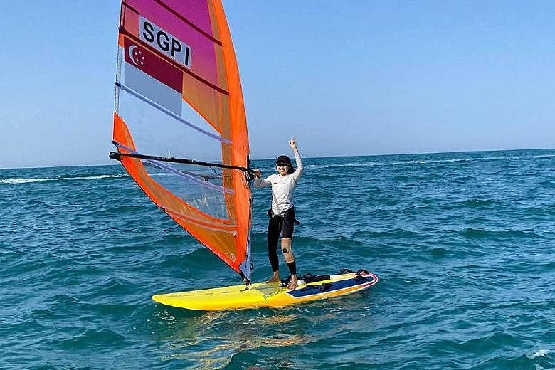 Windsurfer Amanda Ng, when not competing, has been using a wheelchair in Oman since her injury. But she pushed herself in 13 races and topped the three-woman RSX field.