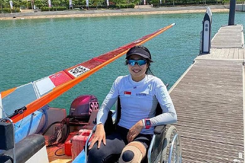Windsurfer Amanda Ng, when not competing, has been using a wheelchair in Oman since her injury. But she pushed herself in 13 races and topped the three-woman RSX field.