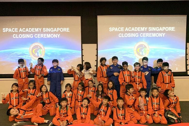Above: The Space Academy Singapore Junior camp is conceptualised and organised by SSTL to encourage young people to take an interest in space. Right: SSTL co-founder and chief executive Lynette Tan says space technology has many applications.