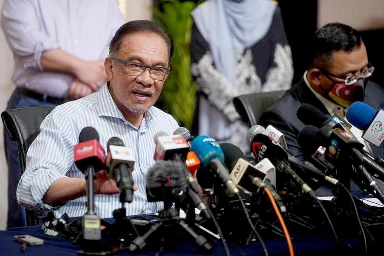 The Pakatan Harapan pact's decision for Mr Anwar Ibrahim to be its prime ministerial candidate comes amid the leak of a controversial audio clip purportedly of him speaking with Umno's president. PHOTO: PARTI KEADILAN RAKYAT