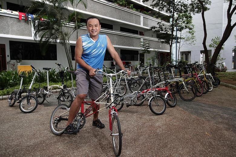 Avid cyclist Jenson Tan (above) has more than 20 bicycles, but is able to store them in his Housing Board flat as they are folding ones.