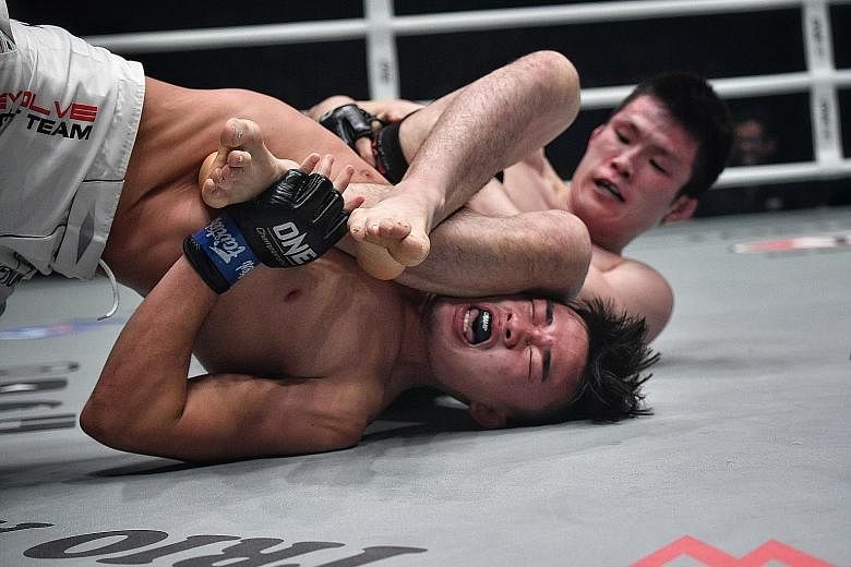 Christian Lee (left) defeated Japanese grappling legend Shinya Aoki two years ago to become One's lightweight champion and he believes that he has what it takes to beat Timofey Nastyukhin today and retain his belt.