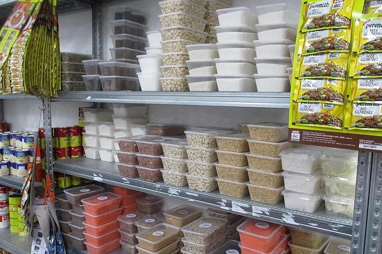 Qiksmart was found repacking food into small containers at an unlicensed location in Ubi Crescent in July last year. PHOTO: SINGAPORE FOOD AGENCY