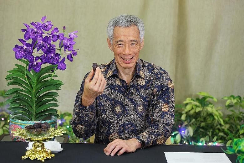 Prime Minister Lee Hsien Loong at the virtual buka puasa (break fast) event yesterday. The annual event - traditionally held at a mosque - was shifted online for the second year in a row due to Covid-19. PHOTO: MCI