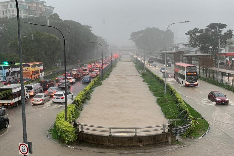 Heavy Rain Triggers Flooding Across Singapore | The Straits Times