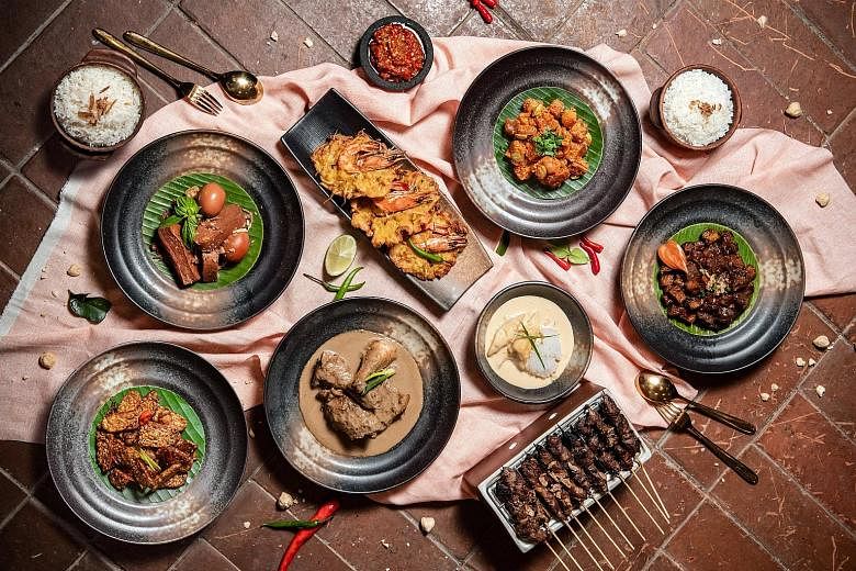 (Above) The spread at Hilton Singapore's Iftar Buffet Pop-up Restaurant includes spicy chermoula baked seabass and egg shakshuka, both hits from last year's pop-up. The mini nasi tumpeng set from Tok Tok Indonesian Soup House. Peppermint's first Ifta