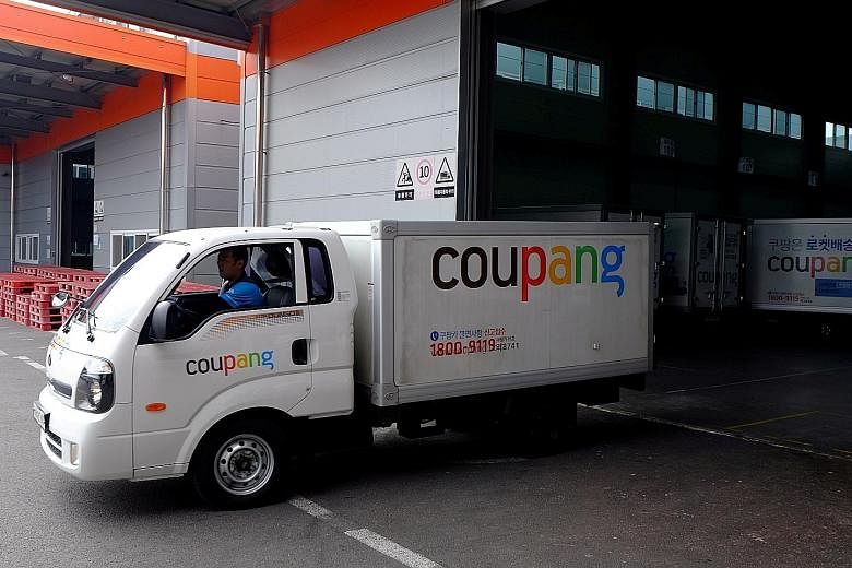 A Coupang delivery truck leaving a distribution centre in Seoul in 2018. Last week, The Korea Economic Daily newspaper reported that Coupang, which is listed on the New York Stock Exchange, will be expanding globally by entering the Singapore market.