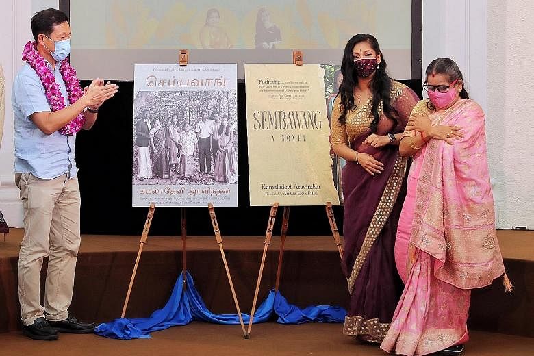 Transport Minister Ong Ye Kung, who was guest of honour at the launch of Sembawang: A Novel, with author Kamaladevi Aravindan (right) and her daughter, Dr Anitha Devi Pillai, who translated the Tamil book into English, at The Arts House yesterday. ST