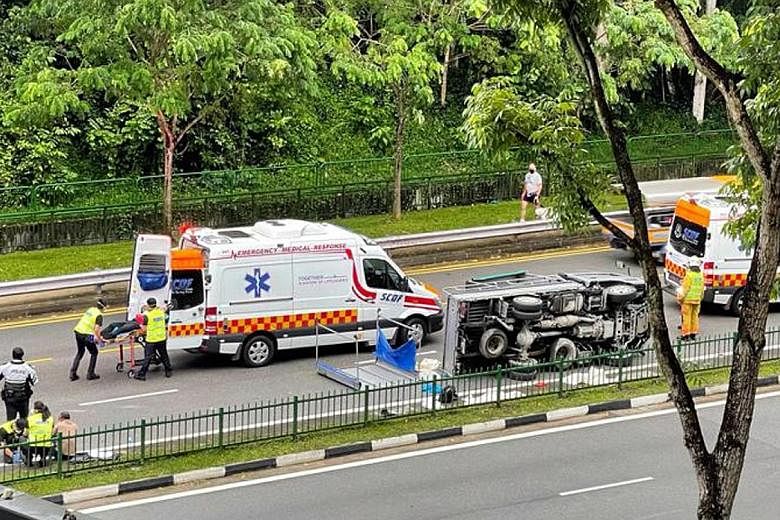 The driver and nine passengers in Saturday morning's lorry accident near The Rail Mall in Upper Bukit Timah Road, understood to be foreign workers, were aged between 26 and 50. PHOTO: LIANHE ZAOBAO