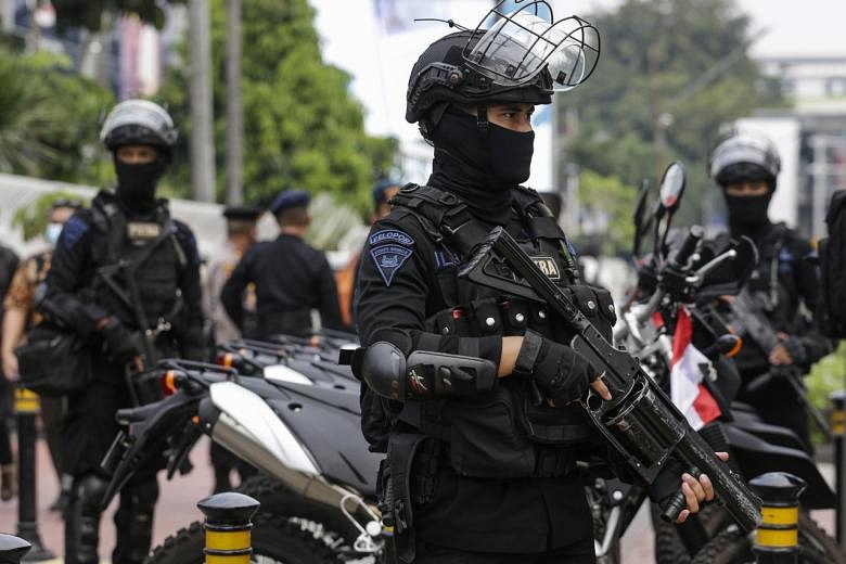 Indonesia Says 10 Killed In Gun Battle With Papua Rebels | The Straits ...