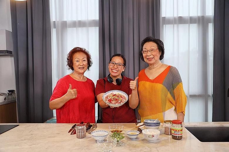 Madam Chin Lai Yin (far left), with heritage researcher Lynn Wong holding a dish of steamed pork belly with salted shrimp paste, and Mrs Vivienne Tan. The Toishanese were among the earliest Chinese migrants to settle down in Singapore, with many work