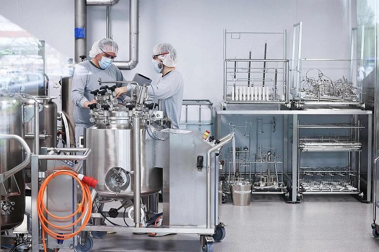 Staff working on the production of the Pfizer-BioNTech Covid-19 vaccine at a plant near Hamburg, Germany. The companies have submitted a request to the European Medicines Agency to expand the use of their vaccine to those aged 12 to 15 years.