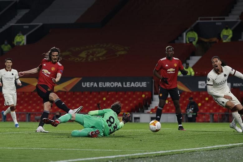 Manchester United's Edinson Cavani scoring the team's third goal in their 6-2 Europa League semi-final, first-leg win on Thursday. He ended the night with two goals and two assists.