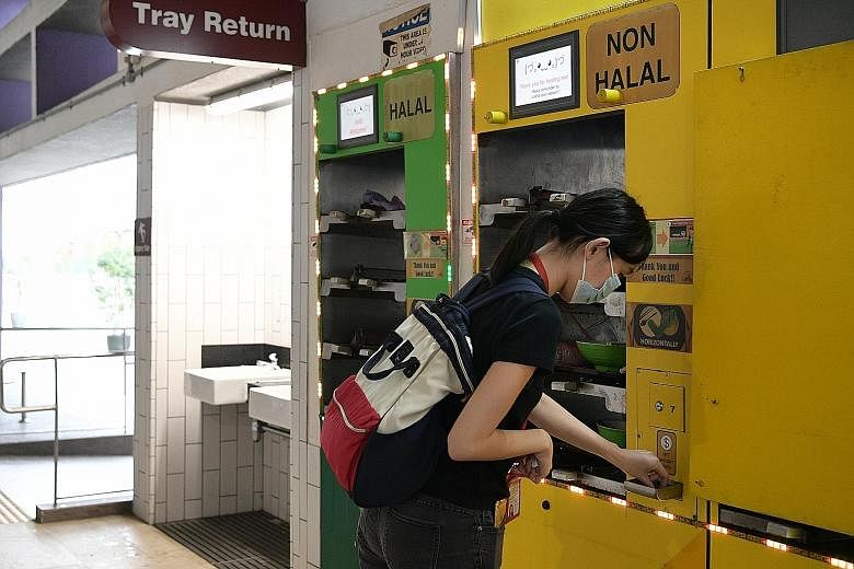 A Smart Tray Return Robot at Gourmet Paradise in Toa Payoh. A tray return station at Bukit Merah Central Food Centre. The Kopitiam @ Our Tampines Hub foodcourt.
