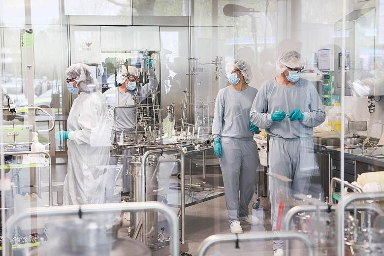 Employees in Allergopharma's plant near Hamburg, Germany, working on production of the Pfizer-BioNTech Covid-19 vaccine last month. The Covid-19 health pandemic has exacerbated and, in many instances, accelerated challenges familiar to media owners, 