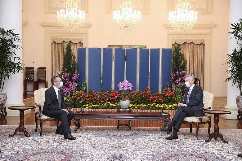 Prime Minister Lee Hsien Loong with Malaysia's Foreign Minister Hishammuddin Hussein at the Istana yesterday. Datuk Seri Hishammuddin also called on Senior Minister Teo Chee Hean during his two-day visit to Singapore. PHOTO: MINISTRY OF COMMUNICATION