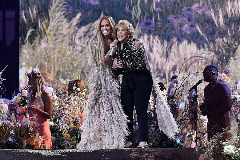 Singer-actress Jennifer Lopez said she spent Christmas without her mum, Ms Guadalupe Rodriguez (both above), for the first time due to the pandemic - before bringing her onstage for a singalong of Sweet Caroline.