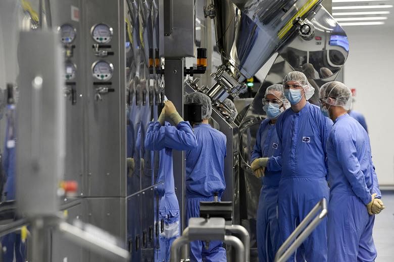Employees at a Pfizer vaccine plant in Belgium last month. A temporary suspension of intellectual property provisions, which prevent developing nations' access to the technology needed to make their own versions of Western-made Covid-19 vaccines, wou