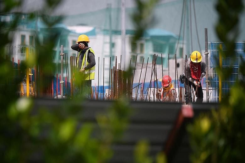 In announcing the tightened restrictions on work pass holders last Friday, the Manpower Ministry gave leeway for workers needed for key strategic projects and infrastructural works to still be allowed entry. ST PHOTO: KUA CHEE SIONG