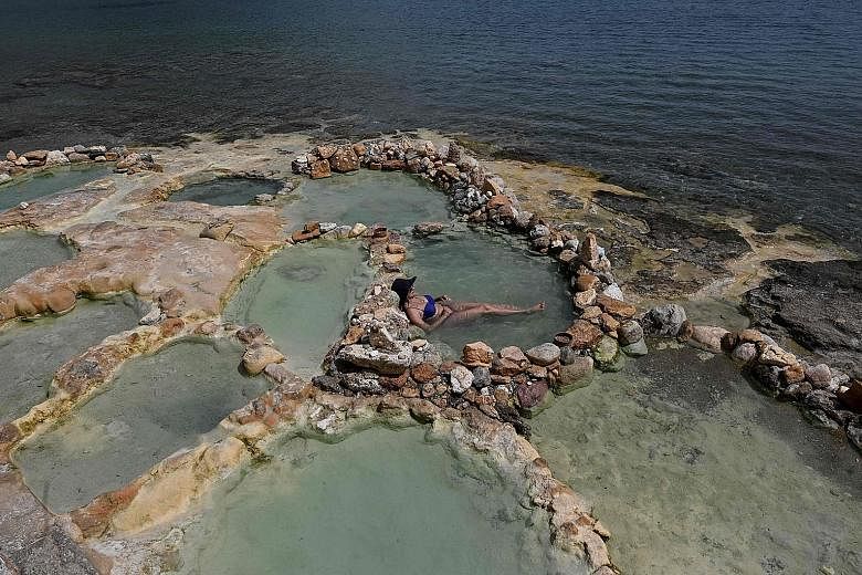 The Edipsos Baths on the Greek island of Euboea last week, as the country prepares to open borders for tourists.