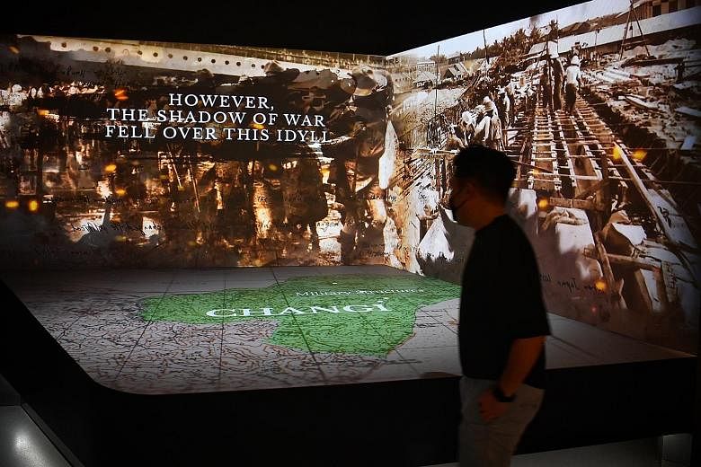 Visitors can view a multimedia show (left) and murals which were painted to give prisoners spiritual solace (above). ST PHOTOS: CHONG JUN LIANG A device hidden in a matchbox - used by prisoners to transmit Morse code - will be on display at the Chang