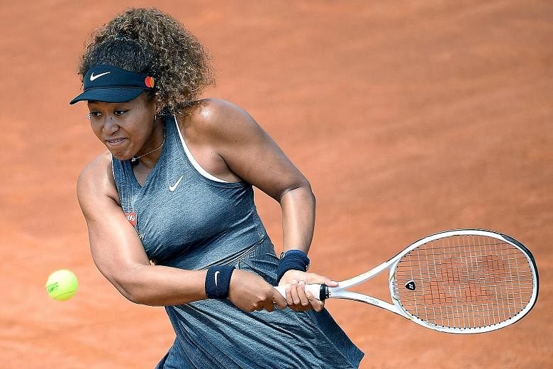 Naomi Osaka struggling on the clay court of the Italian Open during her second round loss to American Jessica Pegula in Rome yesterday. It was her second consecutive loss at the same stage after the Madrid Open.