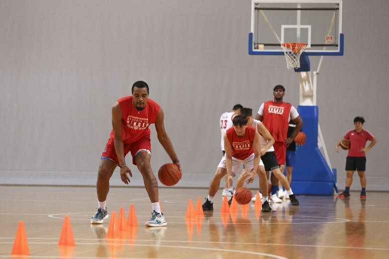 The Singapore Slingers training at the OCBC Arena before Phase 2 (Heightened Alert). Yesterday, they had three courts to six players. 