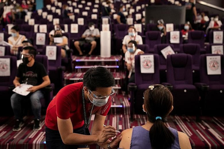 THAILAND People being tested for the coronavirus at a carpark in Bangkok on Monday. Thailand has reported 135,439 infections and 832 deaths since the pandemic began last year. PHOTO: EPA-EFE MALAYSIA A border checkpoint between Kuala Lumpur and Selan