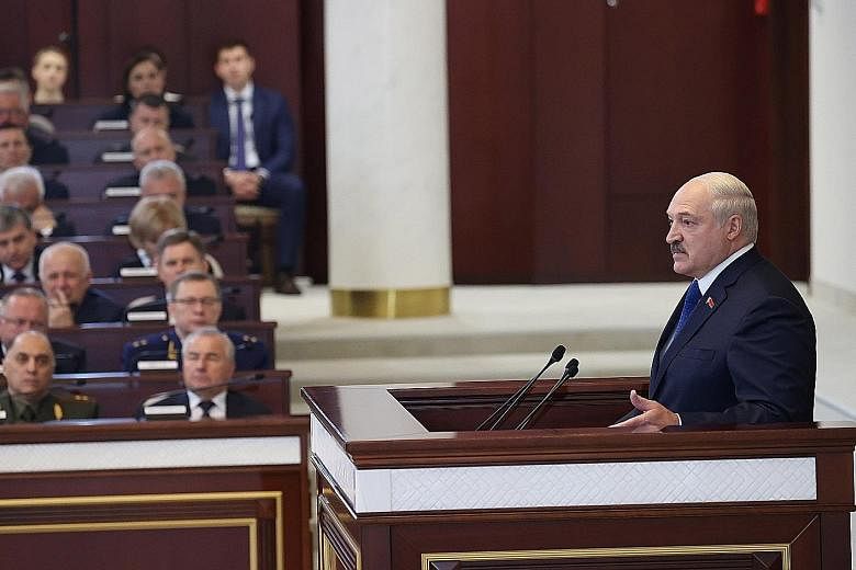Belarusian President Alexander Lukashenko speaking to parliamentarians, members of the Constitutional Commission and representatives of government bodies, at the Parliament in Minsk yesterday. He said "ill-wishers" accusing him of air piracy have "cr