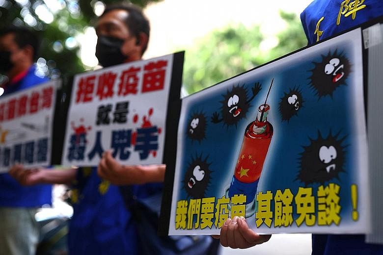 Protesters calling for the Taiwanese government to allow the use of Covid-19 vaccines from China, on Monday. Taiwan has rejected China's vaccines, saying Beijing has not provided adequate information about its shots.