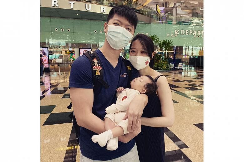 Singaporean Lynette Chua with her husband and two-month-old daughter just before he took a flight back to Hong Kong, where the couple is based, last month. She had booked a flight ticket for her husband to come to Singapore next month under the now-d