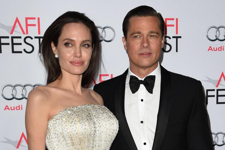 Pitt's lawyers say judge ordered change to Jolie's custody deal The