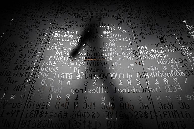 Several notorious hacking groups are suspected of working for Russia's security services and the country's defence ministry set up its own "cyber units" in 2012. PHOTO: AGENCE FRANCE-PRESSE