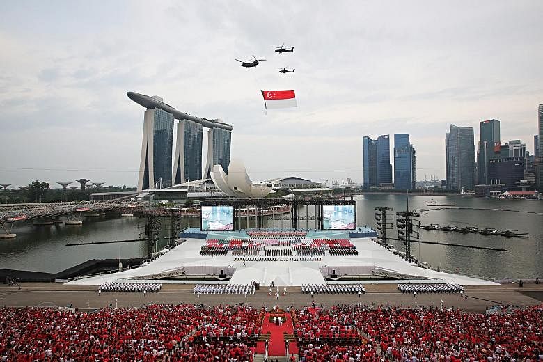 The state flag fly-past at the National Day Parade in 2018, which was the last time the parade was held at the Marina Bay floating platform. When ST visited the floating platform last week, a sign said maintenance was in progress from April 26 to Jul