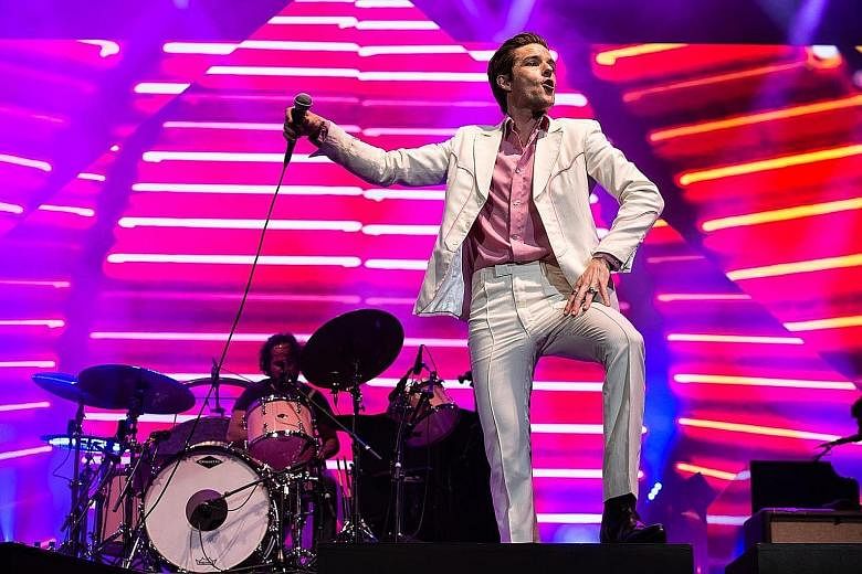 American indie rock band The Killers (left) and American R&B singer Khalid (right) will perform at Splendour XR on July 24 and 25.