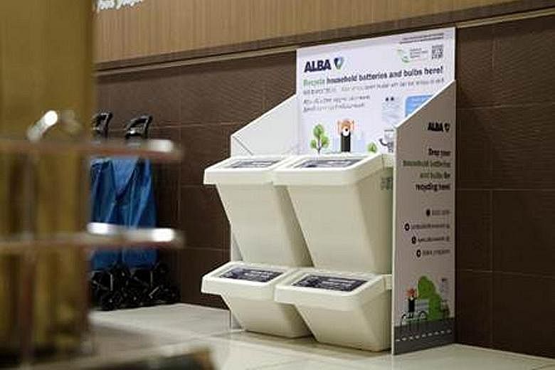 A bin at Harvey Norman Millenia Walk for recycling IT and computer equipment, batteries and light bulbs.