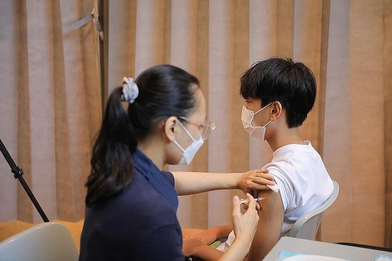 A student getting his vaccination at a centre in ITE College Central on Monday.
