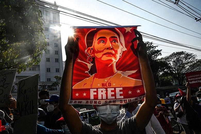 Protesters at a demonstration in February against the military coup in Yangon. The army overthrew Ms Aung San Suu Kyi, the elected leader, saying her party had cheated in November elections, an accusation rejected by the previous election commission 