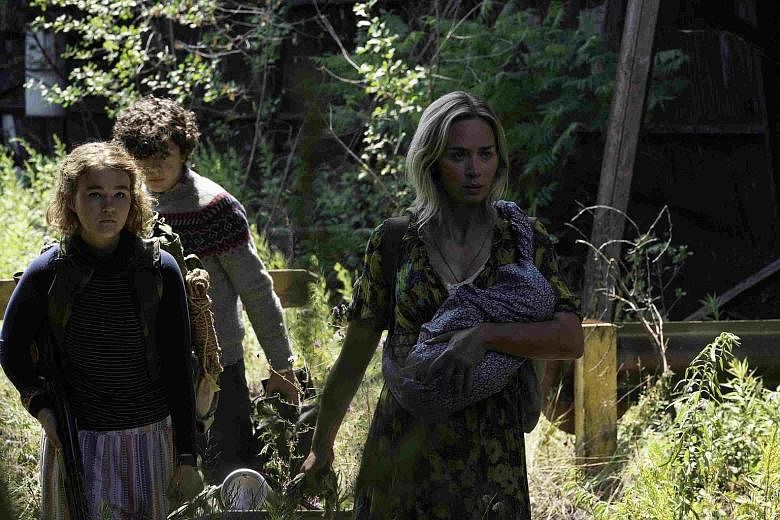 (From left) Millicent Simmonds, Noah Jupe and Emily Blunt in A Quiet Place Part II.