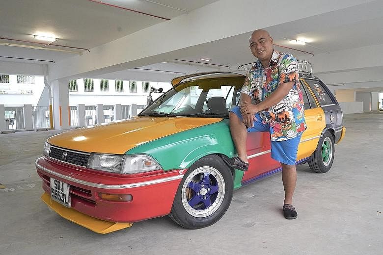 Mr Jasni Arsat drives his 1989 Toyota Corolla Wagon to collect bruised fruit and vegetables from vendors for restocking community fridges.