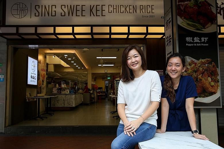 Sing Swee Kee Chicken Rice's director of operations Eliss Pang (left) and brand manager Xian Xiuling. Ms Pang says the GoBusiness site helps business owners in the food and beverage industry as it can "suggest" related licences they may not know are 