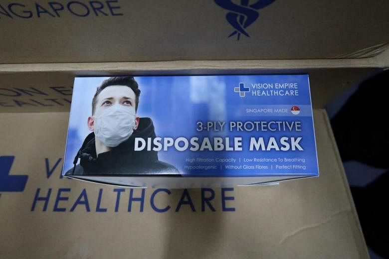 Vision Empire International is under investigation for manufacturing surgical masks without a licence at its Ubi Crescent facility (left) in an unhygienic and makeshift environment. The company is also suspected to have imported surgical masks from o