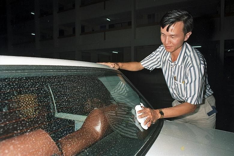 Car owners in Singapore wiping down their vehicles on June 17 and 18, 1991, after ash from the eruption of Mount Pinatubo in the Philippines was blown more than 2,400km to the Republic by high winds.