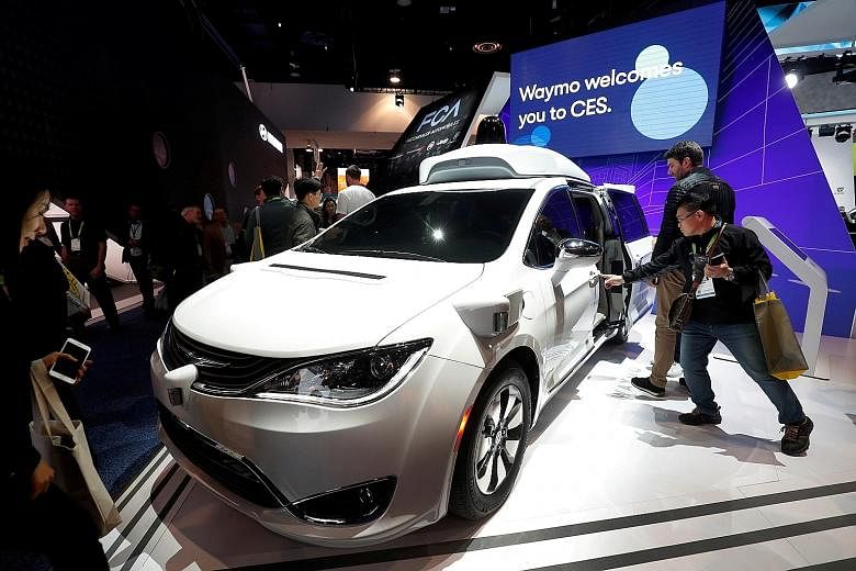 A Waymo autonomous vehicle on display at the 2019 CES in Las Vegas. With self-driving start-ups racing to build war chests to develop and commercialise technology, Alphabet unit Waymo said the capital raised in its first fresh funding round in a year